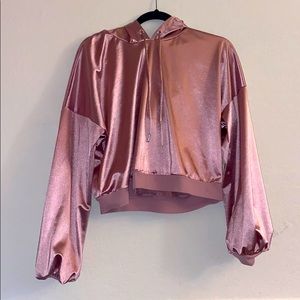 A metallic pink sweatshirt.
